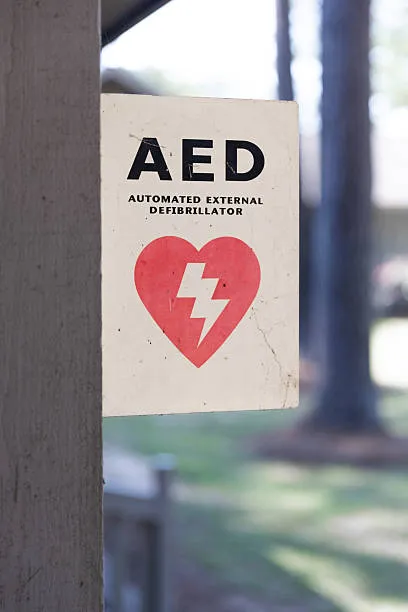 AED automated external defibrillator sign on porch post